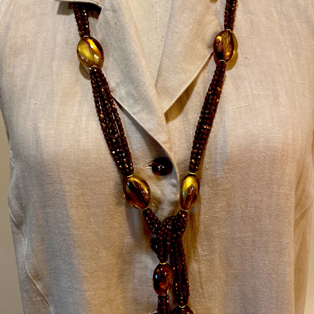 Beautiful amber colored beaded necklace.